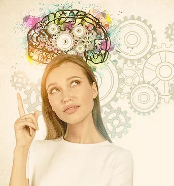 Woman pointing at a colorful illustration of gears and a brain, symbolizing brain health supplements and cognitive function.